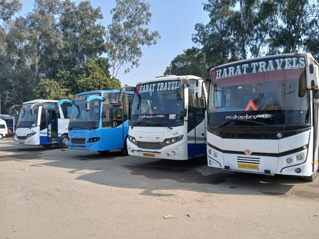 Zirakpur to Rishikesh Bus Hire - Yoga Capital Laxman Jhula & River Rafting Bus Service